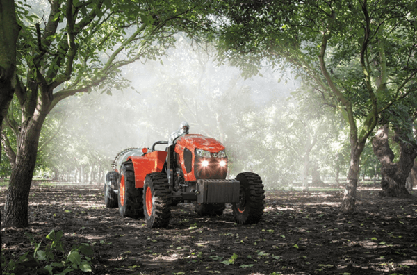 Specialty Tractor moving through vineyard